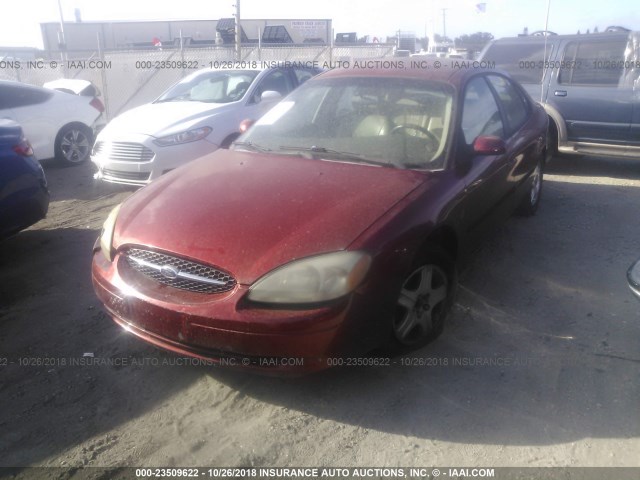 1FAFP56S3YG289590 - 2000 FORD TAURUS SEL RED photo 2