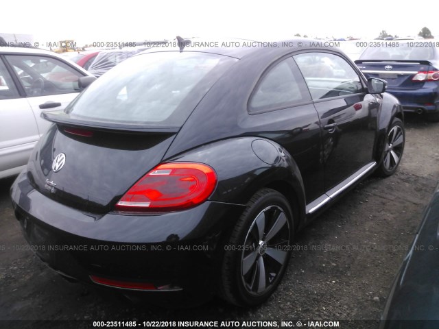 3VWVT7AT7EM628427 - 2014 VOLKSWAGEN BEETLE TURBO BLACK photo 4