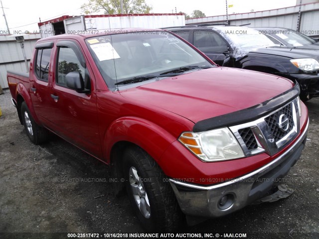 1N6AD07U59C403157 - 2009 NISSAN FRONTIER CREW CAB SE/LE/NISMO RED photo 1