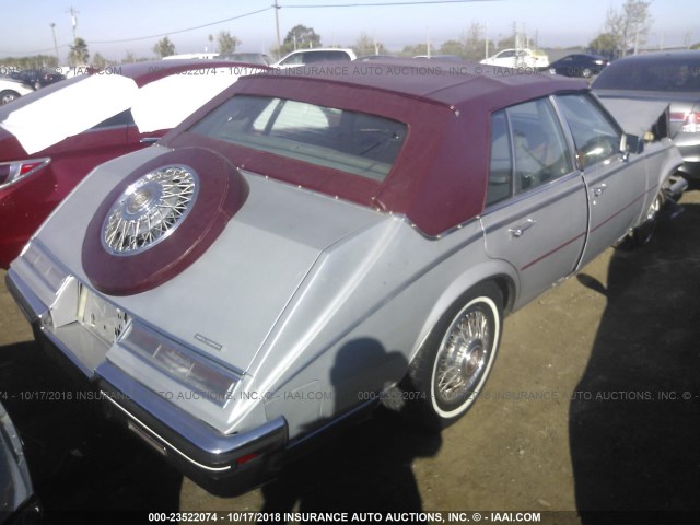 1G6KS6989FE839349 - 1985 CADILLAC SEVILLE SILVER photo 4