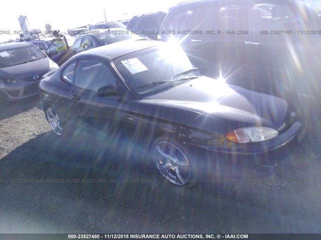 KMHJG24F3WU105011 - 1998 HYUNDAI TIBURON BLACK photo 1