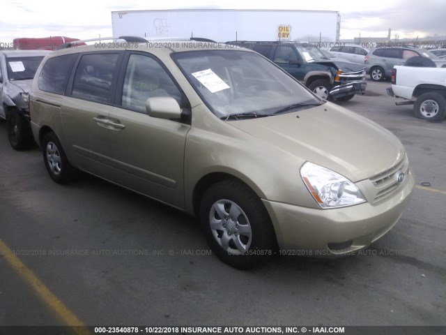 KNDMG4C37A6325124 - 2010 KIA SEDONA LX ოქროსფერი ფოტო 1