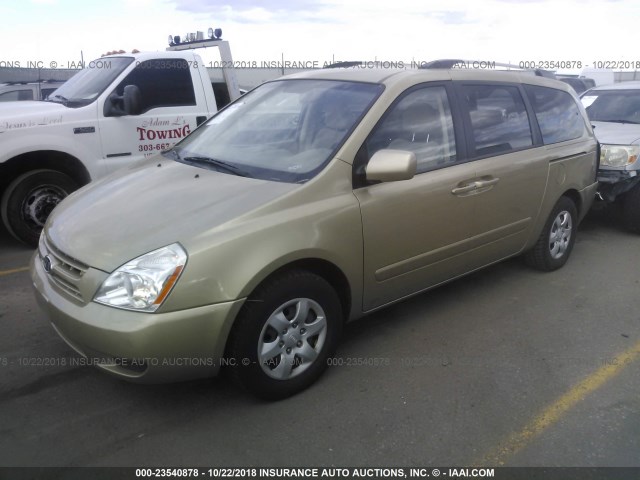 KNDMG4C37A6325124 - 2010 KIA SEDONA LX ოქროსფერი ფოტო 2