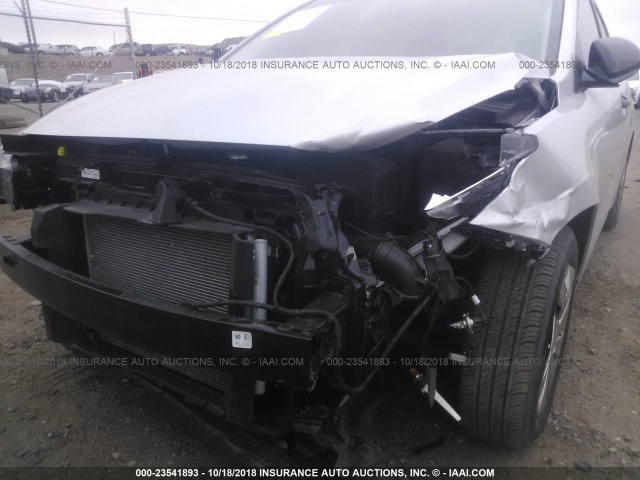 3KPA24AB3JE065715 - 2018 KIA RIO LX/S SILVER photo 6