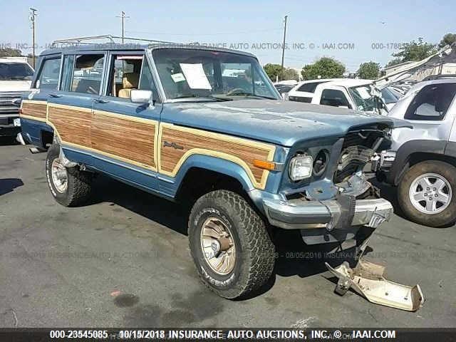 1JCNJ15U6HT049894 - 1987 JEEP GRAND WAGONEER  BLUE photo 1