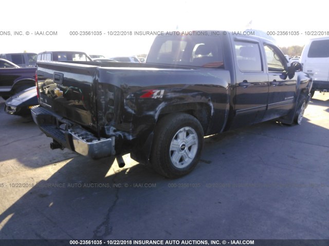 1GCPKSE32BF149324 - 2011 CHEVROLET SILVERADO K1500 LT BLACK photo 4