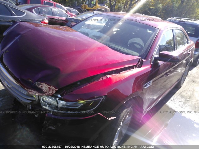 1FAHP2E85JG107262 - 2018 FORD TAURUS SEL MAROON photo 2