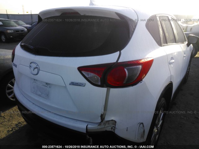 JM3KE2BY5G0849468 - 2016 MAZDA CX-5 SPORT WHITE photo 4