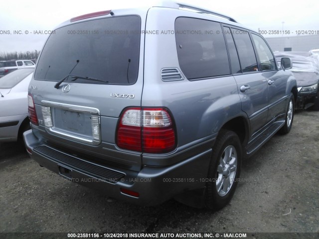 JTJHT00W443537566 - 2004 LEXUS LX 470 Light Blue photo 4