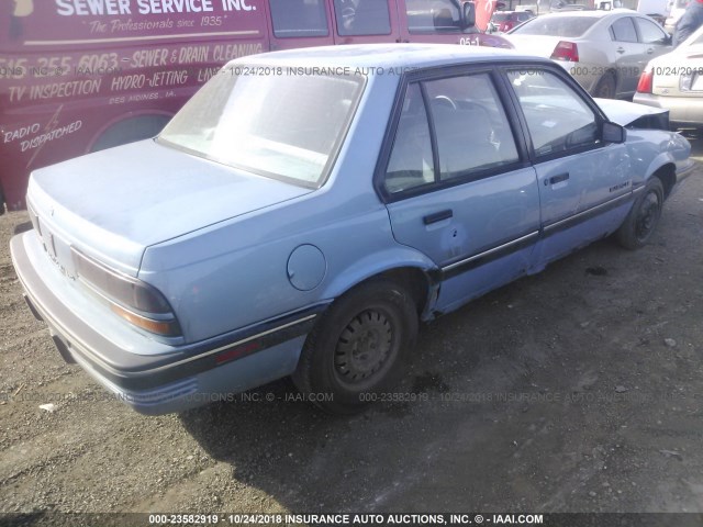 1G2JB54K5M7507890 - 1991 PONTIAC SUNBIRD LE BLUE photo 4