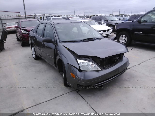 1FAFP34N46W104256 - 2006 FORD FOCUS ZX4 GRAY photo 1