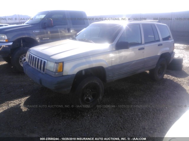 1J4FX58S6VC546777 - 1997 JEEP GRAND CHEROKEE LAREDO/TSI SILVER photo 2