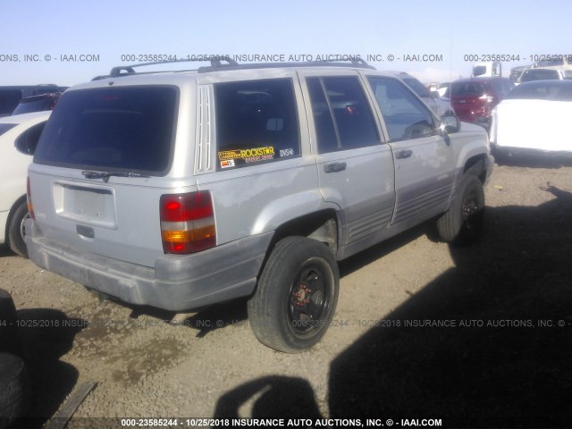 1J4FX58S6VC546777 - 1997 JEEP GRAND CHEROKEE LAREDO/TSI SILVER photo 4