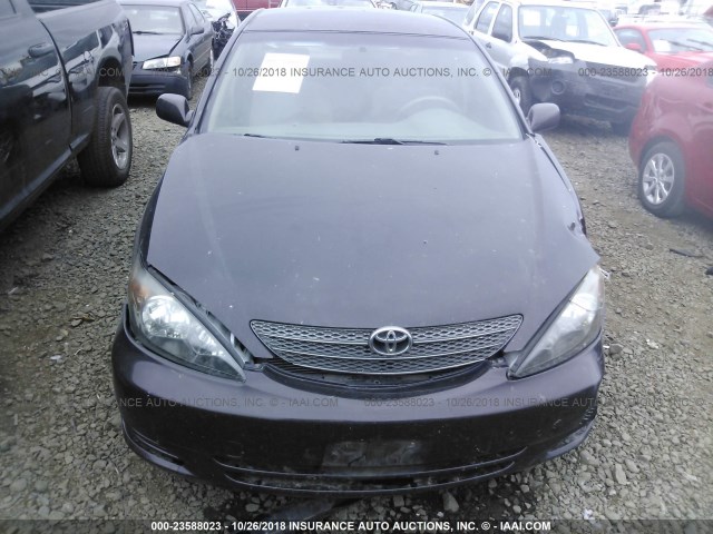 JTDBE32K140266871 - 2004 TOYOTA CAMRY LE/XLE BLACK photo 6