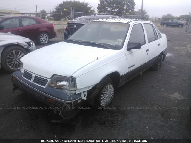 KL2TR51K5KB333840 - 1989 PONTIAC LEMANS SE WHITE photo 2