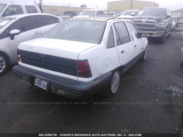 KL2TR51K5KB333840 - 1989 PONTIAC LEMANS SE WHITE photo 4