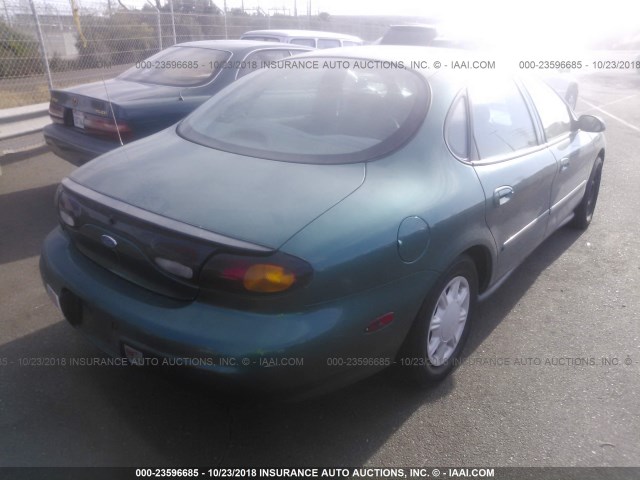 1FALP51U3VG147263 - 1997 FORD TAURUS G GREEN photo 4