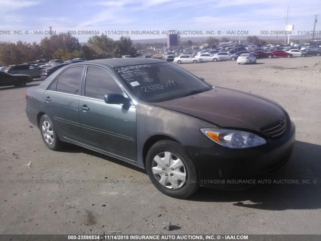 JTDBE32K230199440 - 2003 TOYOTA CAMRY LE/XLE GREEN photo 1