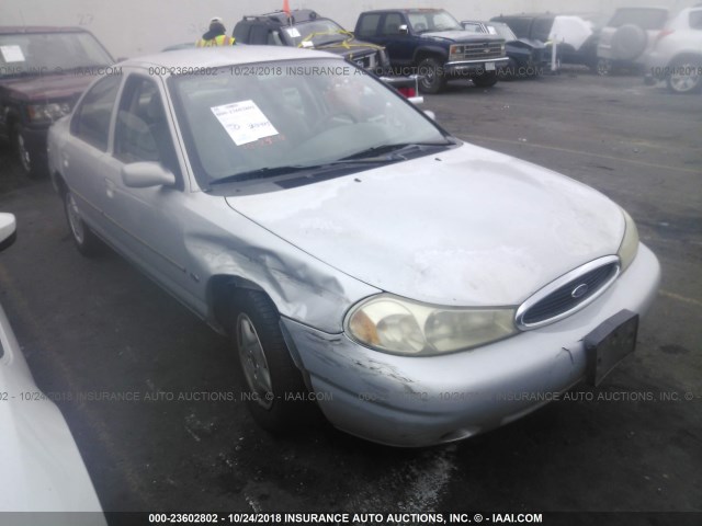 1FAFP6636XK211749 - 1999 FORD CONTOUR SE SILVER photo 1