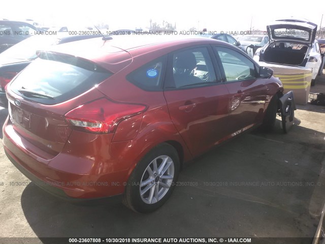 1FADP3K21JL287559 - 2018 FORD FOCUS SE ORANGE photo 4