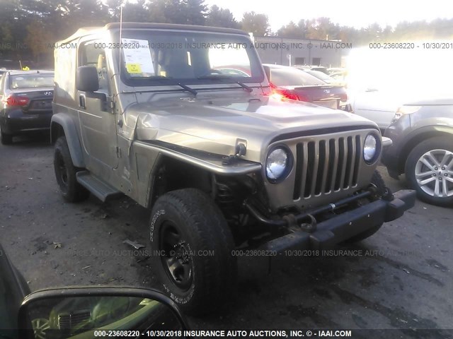 1J4FA49S24P721916 - 2004 JEEP WRANGLER / TJ SPORT TAN photo 1