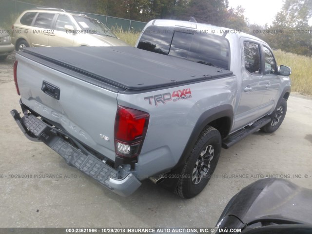 5TFCZ5AN9JX151857 - 2018 TOYOTA TACOMA DBL CAB/SR/TRDSPT/OR/PRO GRAY photo 4