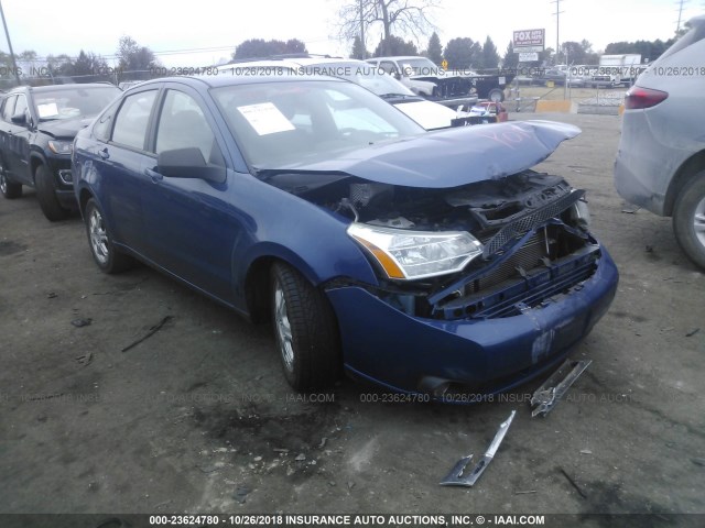 1FAHP36NX9W119564 - 2009 FORD FOCUS SES BLUE photo 1