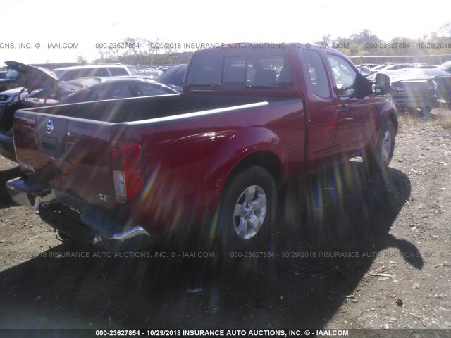 1N6AD0CU7AC439331 - 2010 NISSAN FRONTIER KING CAB SE/LE/NISMO RED photo 4