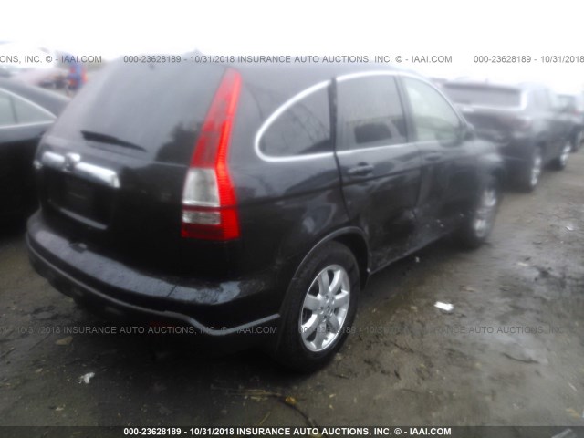 JHLRE38797C082382 - 2007 HONDA CR-V EXL BLACK photo 4