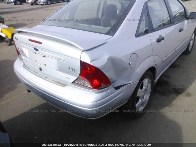 1FAFP38Z04W105169 - 2004 FORD FOCUS ZTS GRAY photo 6