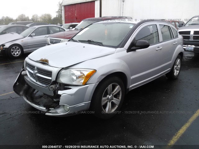 1B3CB3HA0BD228714 - 2011 DODGE CALIBER MAINSTREET SILVER photo 2