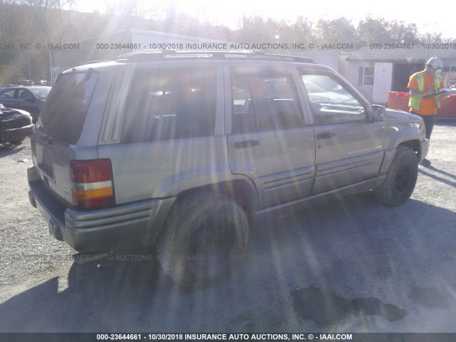 1J4GZ88Z0WC234548 - 1998 JEEP GRAND CHEROKEE LIMITED 5.9L SILVER photo 4