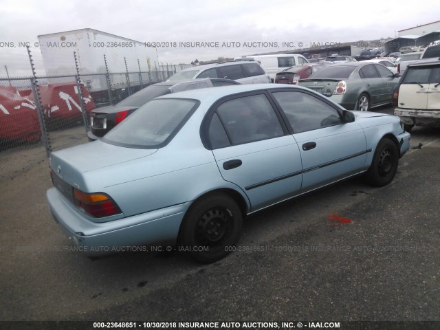 1NXAE09BXSZ260746 - 1995 TOYOTA COROLLA LE/DX TEAL photo 4