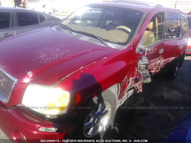 1GKDS13S732225348 - 2003 GMC ENVOY RED photo 6