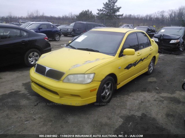 JA3AJ86E83U021418 - 2003 MITSUBISHI LANCER OZ RALLY YELLOW photo 2