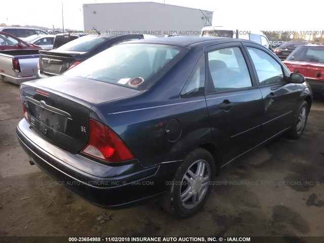 1FAFP34303W233525 - 2003 FORD FOCUS SE COMFORT/SE SPORT Dark Blue photo 4