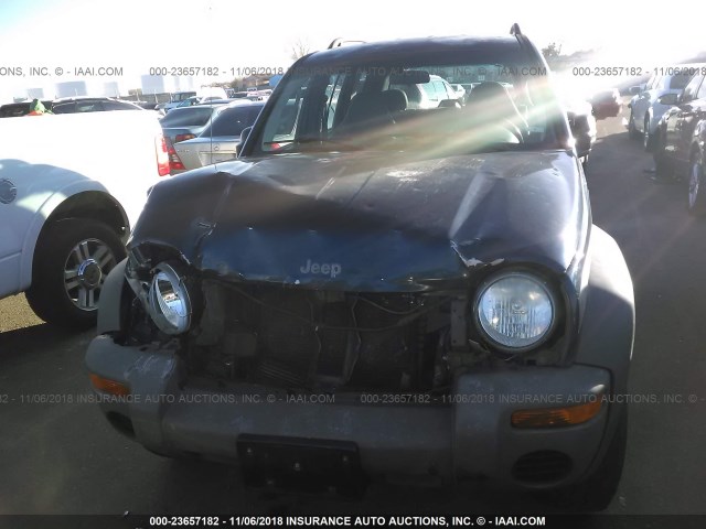 1J4GL48K74W304524 - 2004 JEEP LIBERTY SPORT BLUE photo 6