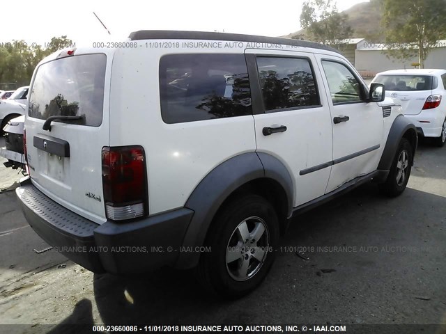 1D8GU28K07W655630 - 2007 DODGE NITRO SXT WHITE photo 4