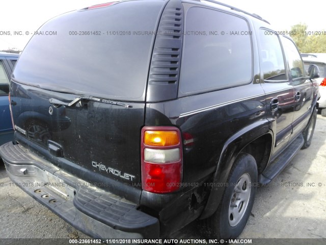 1GNEK13T31R125672 - 2001 CHEVROLET TAHOE K1500 BLACK photo 4