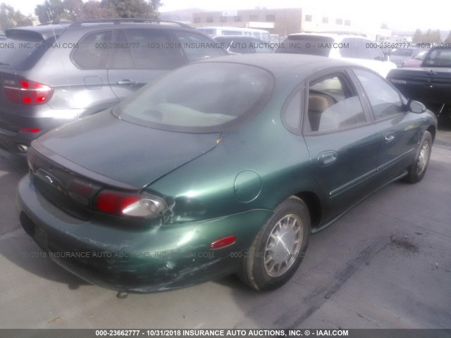 1FAFP53S0XG108691 - 1999 FORD TAURUS SE/COMFORT/SPORT GREEN photo 4