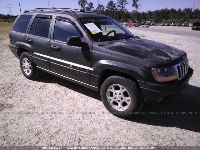 1J4GW48S1YC266514 - 2000 JEEP GRAND CHEROKEE  BLACK photo 1