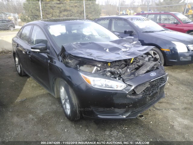 1FADP3F24FL239247 - 2015 FORD FOCUS SE BLACK photo 1