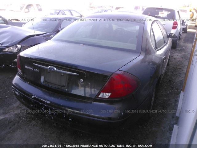 1FAFP55U62A184538 - 2002 FORD TAURUS SES BLUE photo 4