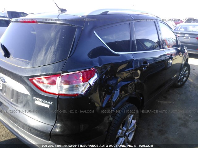 1FMCU0J94EUA87038 - 2014 FORD ESCAPE TITANIUM BLACK photo 4