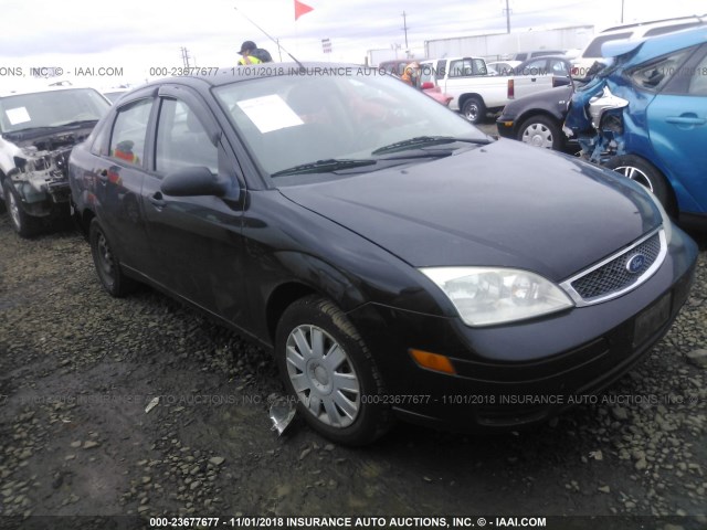 1FAFP34N25W164969 - 2005 FORD FOCUS ZX4 BLACK photo 1