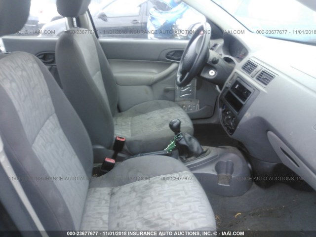 1FAFP34N25W164969 - 2005 FORD FOCUS ZX4 BLACK photo 5