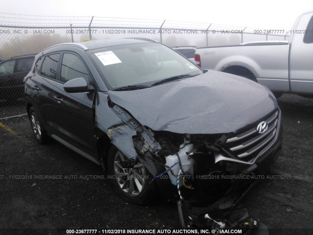 KM8J3CA48JU734552 - 2018 HYUNDAI TUCSON SE BLUE photo 1