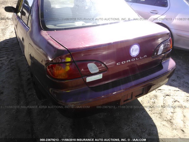 2T1BR12E6YC327498 - 2000 TOYOTA COROLLA VE/CE/LE RED photo 6