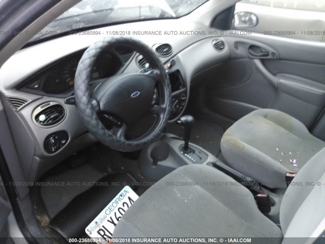 1FAFP36P7YW201727 - 2000 FORD FOCUS SE/SE COMFORT SILVER photo 5