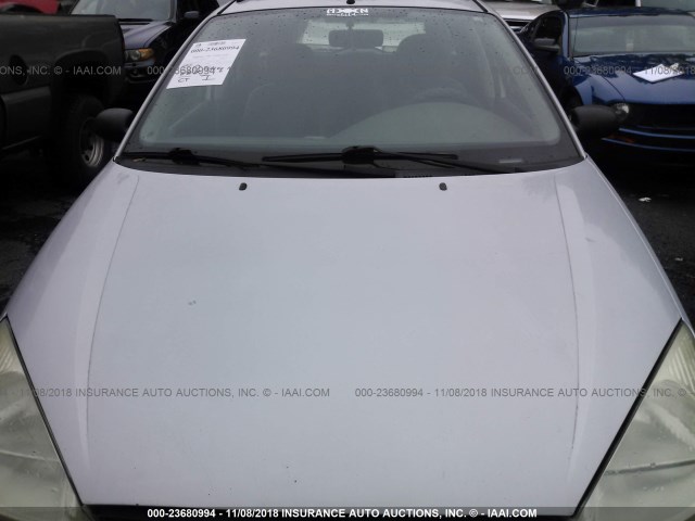 1FAFP36P7YW201727 - 2000 FORD FOCUS SE/SE COMFORT SILVER photo 6